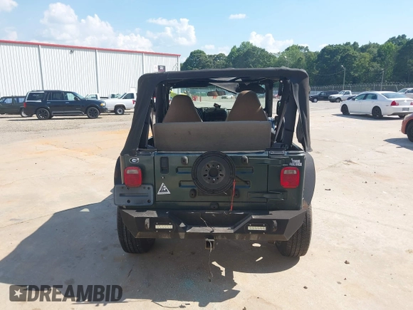 2002 Jeep Wrangler Sport with VIN 1J4FA49S52P760173, listed as a IAAI auction lot 42468550 with 201,682 mi miles and . Bid and sale history available at DreamBid. Image 16.