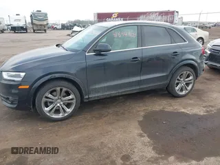 2015 Audi Q3 Prestige with VIN WA1GFCFS5FR009590, listed as a IAAI auction lot 41694903 with 164,193 mi miles and . Bid and sale history available at DreamBid. Image 17.