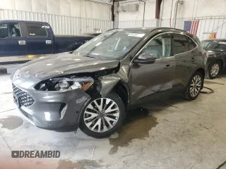 2020 Ford Escape Titanium Hybrid z VIN 1FMCU9DZ7LUA95938, wystawiony jako Copart lot #58720595 z przebiegiem 49 963 mil mil oraz Szkoda całkowita • Salvage title. Historia ofert i sprzedaży dostępna na DreamBid. Obrazek 1.