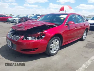 2014 Chevrolet Impala LT with VIN 2G1WB5E38E1132304, listed as a IAAI auction lot 42072869 with 128,579 mi miles and . Bid and sale history available at DreamBid. Image 2.