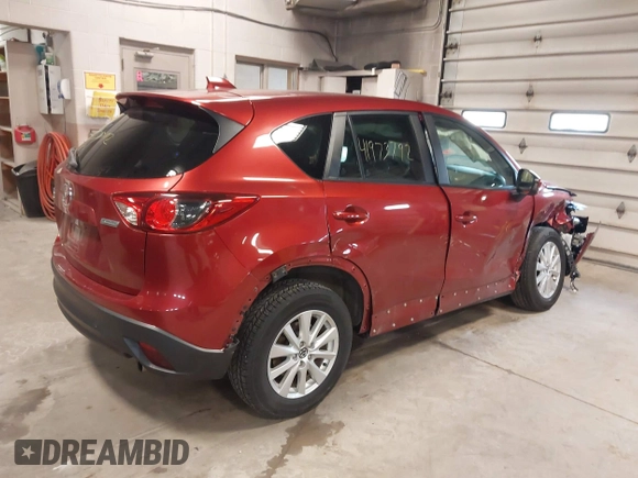 2013 Mazda CX-5 Touring with VIN JM3KE4CEXD0120913, listed as a IAAI auction lot 41973792 with 129,202 mi miles. Bid and sale history available at carsss.com. Image 4.