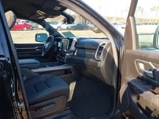 2023 Ram 1500 Big Horn with VIN 1C6SRFFT1PN660751, listed as a IAAI auction lot 41692496 with 30,215 mi miles and . Bid and sale history available at DreamBid. Image 5.
