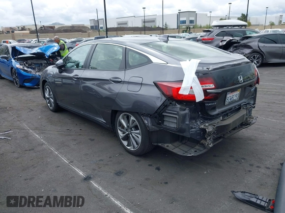2018 Honda Clarity Plug-In Hybrid with VIN JHMZC5F14JC017006, listed as a IAAI auction lot 42064754 with 36,976 mi miles. Bid and sale history available at carsss.com. Image 3.