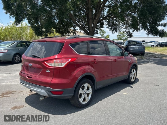 2013 Ford Escape SE with VIN 1FMCU9G95DUD25554, listed as a Copart auction lot 58242885 with Not provided miles and Clean title. Bid and sale history available at DreamBid. Image 4.