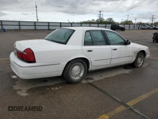 1999 Mercury Grand Marquis LS с VIN 2MEFM75W6XX619412, выставлен на аукционе Copart как лот 51939515 с пробегом 131 784 миль миль и Списание • Salvage title. История ставок и продаж доступна на DreamBid. Изображение 3.