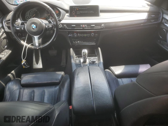 2015 BMW X6 xDrive35i z VIN 5UXKU2C58F0N77513, wystawiony jako Copart lot #55859345 z przebiegiem 82 560 mil mil oraz Szkoda całkowita • Salvage title. Historia ofert i sprzedaży dostępna na DreamBid. Obrazek 8.