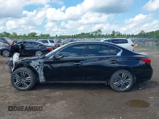 2014 Infiniti Q50 Premium with VIN JN1BV7AR0EM705304, listed as a IAAI auction lot 42619040 with 81,848 mi miles and . Bid and sale history available at DreamBid. Image 15.