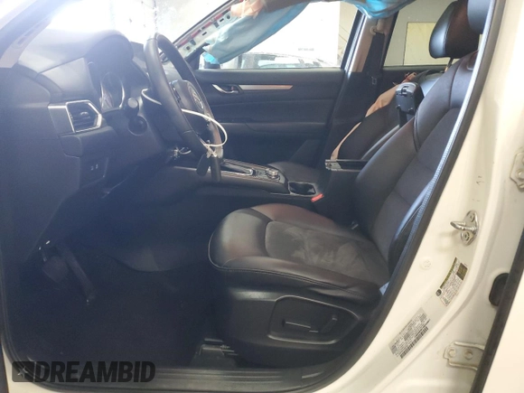 2019 Mazda CX-5 Touring with VIN JM3KFBCM1K0697500, listed as a Copart auction lot 46460735 with 69,412 mi miles and Salvage Title. Bid and sale history available at carsss.com. Image 7.