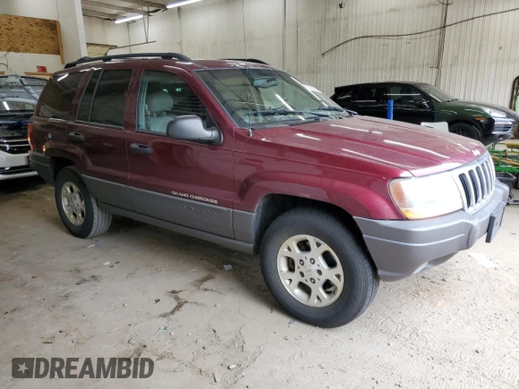 2001 Jeep Grand Cherokee Laredo z VIN 1J4GW48S11C609344, wystawiony jako Copart lot #59258245 z przebiegiem 162 141 mil mil oraz Szkoda całkowita • Salvage title. Historia ofert i sprzedaży dostępna na DreamBid. Obrazek 4.