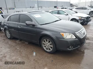 2009 Toyota Avalon XL with VIN 4T1BK36B19U333046, listed as a IAAI auction lot 41895870 with 185,626 mi miles. Bid and sale history available at carsss.com. Image 1.