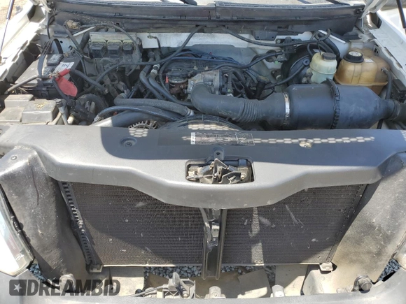 2005 Ford F-150 XL with VIN 1FTRF12255NB53669, listed as a Copart auction lot 61636135 with 156,562 mi miles and Salvage title. Bid and sale history available at DreamBid. Image 11.