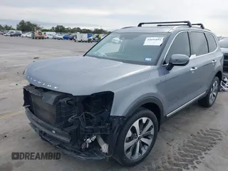 2020 Kia Telluride S with VIN 5XYP64HC9LG016294, listed as a IAAI auction lot 41691851 with 104,723 mi miles and . Bid and sale history available at DreamBid. Image 2.