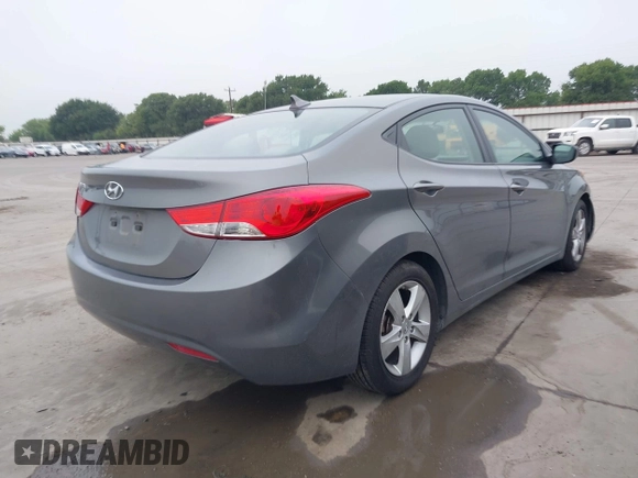 2013 Hyundai Elantra GLS with VIN 5NPDH4AE5DH239502, listed as a IAAI auction lot 42130967 with 100,105 mi miles and . Bid and sale history available at DreamBid. Image 4.