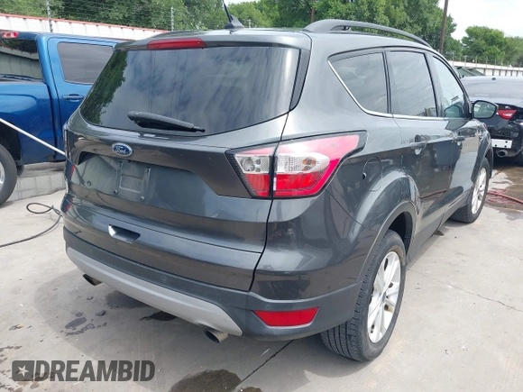 2018 Ford Escape SEL with VIN 1FMCU9HD2JUC07749, listed as a IAAI auction lot 41981145 with 49,694 mi miles. Bid and sale history available at carsss.com. Image 4.