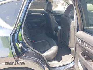 2018 Mazda CX-5 Touring z VIN JM3KFACM7J1410275, wystawiony jako IAAI lot #42248830 z przebiegiem 101 125 mil mil oraz . Historia ofert i sprzedaży dostępna na DreamBid. Obrazek 8.