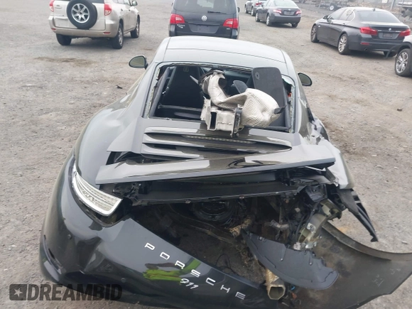2014 Porsche 911 Carrera with VIN WP0AA2A92ES106536, listed as a IAAI auction lot 42048411 with 108,216 mi miles and . Bid and sale history available at DreamBid. Image 16.