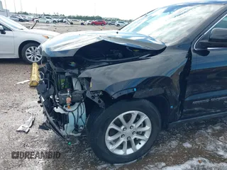 2021 Jeep Grand Cherokee Laredo X with VIN 1C4RJEAG2MC511713, listed as a IAAI auction lot 42343008 with 71,192 mi miles and . Bid and sale history available at DreamBid. Image 18.