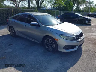 2016 Honda Civic EX-L z VIN 19XFC1F72GE045258, wystawiony jako IAAI lot #42315438 z przebiegiem 108 490 mil mil oraz . Historia ofert i sprzedaży dostępna na DreamBid. Obrazek 1.