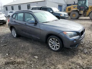 2015 BMW X1 xDrive28i with VIN WBAVL1C5XFVY31265, listed as a Copart auction lot 47543025 with 124,986 mi miles and Salvage Title. Bid and sale history available at carsss.com. Image 4.
