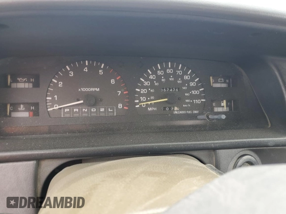 1995 Toyota T100 DX with VIN JT4VD12E2S0009844, listed as a Copart auction lot 51738525 with 357,475 mi miles and Salvage Title. Bid and sale history available at carsss.com. Image 9.