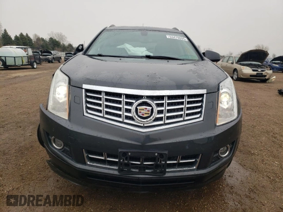 2014 Cadillac SRX Performance Collection z VIN 3GYFNCE36ES661204, wystawiony jako Copart lot #53478095 z przebiegiem 66 613 mil mil oraz Szkoda całkowita • Salvage title. Historia ofert i sprzedaży dostępna na DreamBid. Obrazek 5.
