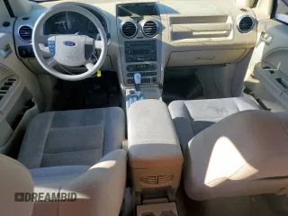 2005 Ford Freestyle SE z VIN 1FMZK01175GA28106, wystawiony jako Copart lot #56126035 z przebiegiem 121 936 mil mil oraz Szkoda całkowita • Salvage title. Historia ofert i sprzedaży dostępna na DreamBid. Obrazek 8.