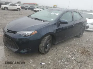 2019 Toyota Corolla L with VIN 5YFBURHE8KP898955, listed as a Copart auction lot 59364385 with 84,210 mi miles and Salvage title. Bid and sale history available at DreamBid. Image 1.