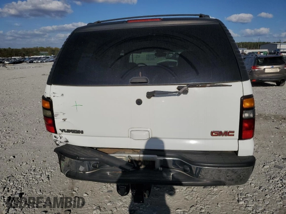 2005 GMC Yukon SLE with VIN 1GKEC13T15J230550, listed as a Copart auction lot 77214624 with 203,095 mi miles and Salvage Title. Bid and sale history available at carsss.com. Image 6.