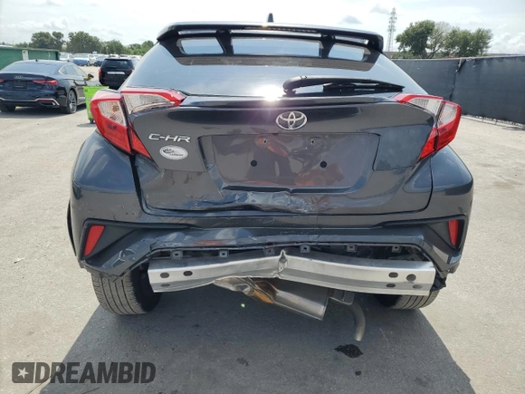 2022 Toyota C-HR XLE z VIN NMTKHMBX2NR140945, wystawiony jako Copart lot #58809375 z przebiegiem 56 161 mil mil oraz Nie do naprawy • Non repairable. Historia ofert i sprzedaży dostępna na DreamBid. Obrazek 6.