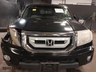 2011 Honda Pilot Touring with VIN 5FNYF4H97BB099528, listed as a IAAI auction lot 41721800 with 132,979 mi miles. Bid and sale history available at carsss.com. Image 12.
