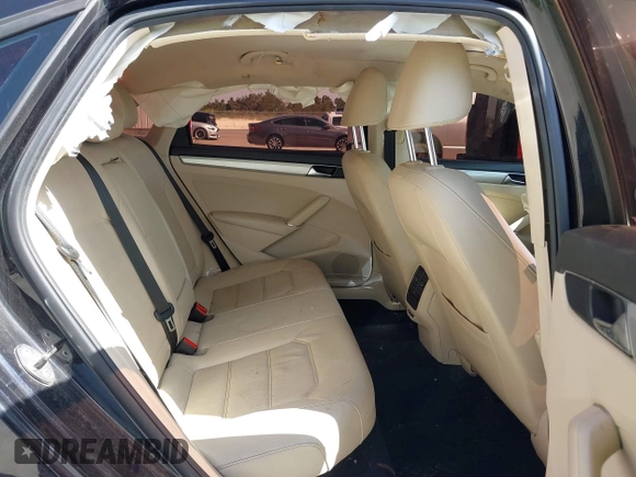 2019 Volkswagen Passat 2.0T Wolfsburg Edition with VIN 1VWLA7A30KC009646, listed as a IAAI auction lot 39842320 with 101,006 mi miles. Bid and sale history available at carsss.com. Image 8.