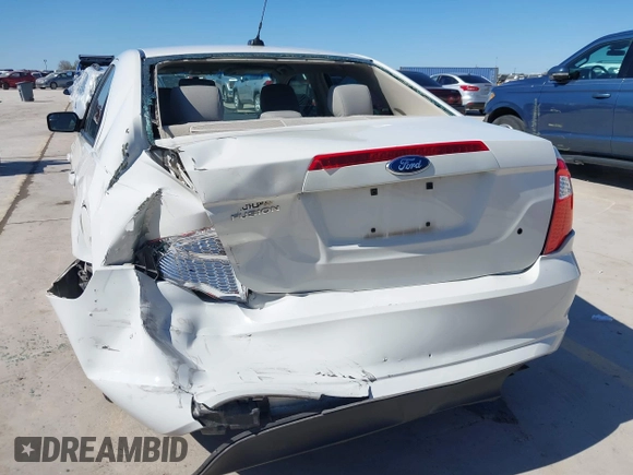 2012 Ford Fusion S with VIN 3FAHP0GA0CR137074, listed as a IAAI auction lot 41756162 with 165,205 mi miles. Bid and sale history available at carsss.com. Image 6.