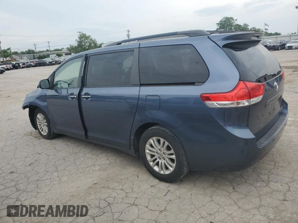 2014 Toyota Sienna XLE with VIN 5TDYK3DC2ES520840, listed as a Copart auction lot 59672295 with 194,143 mi miles and Salvage title. Bid and sale history available at DreamBid. Image 2.