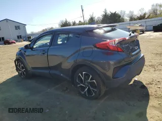 2019 Toyota C-HR XLE z VIN NMTKHMBX4KR084471, wystawiony jako Copart lot #52575985 z przebiegiem 54 578 mil mil oraz Szkoda całkowita • Salvage title. Historia ofert i sprzedaży dostępna na DreamBid. Obrazek 2.