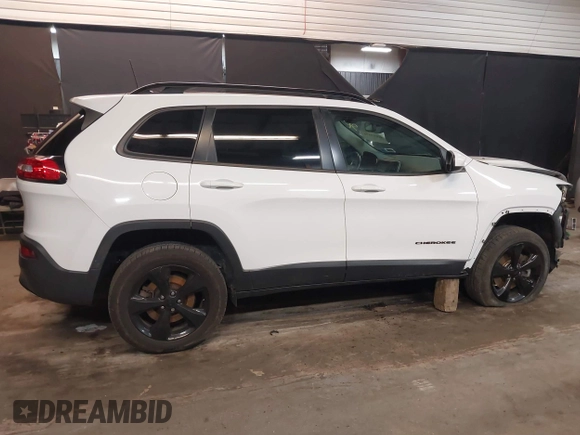 2018 Jeep Cherokee Latitude z VIN 1C4PJMCX0JD505901, wystawiony jako IAAI lot #41615476 z przebiegiem 106 873 mil mil oraz . Historia ofert i sprzedaży dostępna na DreamBid. Obrazek 14.