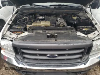 1999 Ford Super Duty F-250 XL with VIN 1FTNW21F0XEA24718, listed as a Copart auction lot 44987595 with 327,455 mi miles and Salvage Title. Bid and sale history available at carsss.com. Image 11.