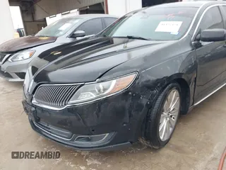 2013 Lincoln MKS EcoBoost with VIN 1LNHL9FT2DG604724, listed as a IAAI auction lot 41428420 with 152,880 mi miles and . Bid and sale history available at DreamBid. Image 6.