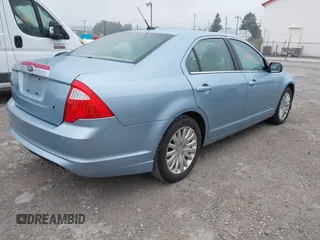 2010 Ford Fusion Hybrid with VIN 3FADP0L36AR353966, listed as a IAAI auction lot 42611738 with 200,522 mi miles and . Bid and sale history available at DreamBid. Image 4.