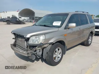 2006 Honda Pilot EX-L with VIN 5FNYF18586B028291, listed as a IAAI auction lot 42040904 with 217,038 mi miles and . Bid and sale history available at carsss.com. Image 21.