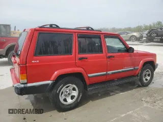 1999 Jeep Cherokee Sport with VIN 1J4FF68S3XL667570, listed as a Copart auction lot 52821105 with 173,712 mi miles and Salvage Title. Bid and sale history available at DreamBid. Image 3.