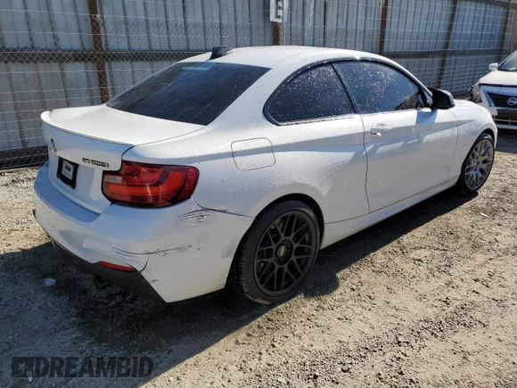 2016 BMW 2 Series M235i with VIN WBA1J7C59GV359763, listed as a Copart auction lot 81778914 with 120,497 mi miles and Salvage title. Bid and sale history available at DreamBid. Image 3.