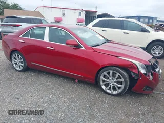 2014 Cadillac ATS Premium z VIN 1G6AE5S33E0125546, wystawiony jako IAAI lot #41989269 z przebiegiem 55 945 mil mil oraz . Historia ofert i sprzedaży dostępna na DreamBid. Obrazek 1.