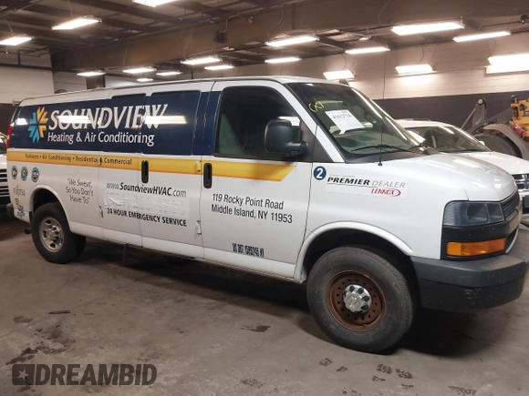 2020 Chevrolet Express Cargo Van with VIN 1GCWGBFB4L1205443, listed as a IAAI auction lot 41612714 with 87,883 mi miles. Bid and sale history available at carsss.com. Image 13.