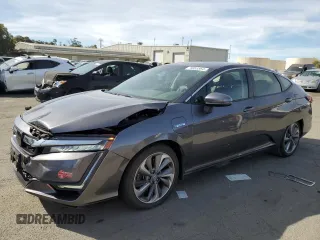 2018 Honda Clarity Plug-In Hybrid Touring with VIN JHMZC5F3XJC004522, listed as a Copart auction lot 74853564 with 136,707 mi miles and Salvage Title. Bid and sale history available at carsss.com. Image 1.