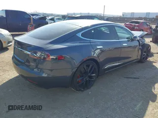 2018 Tesla Model S 75D with VIN 5YJSA1E49JF294699, listed as a IAAI auction lot 41567770 with 34,644 mi miles and . Bid and sale history available at DreamBid. Image 4.