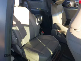 2015 Toyota Sienna XLE with VIN 5TDYK3DC9FS610925, listed as a IAAI auction lot 42022267 with 153,997 mi miles. Bid and sale history available at carsss.com. Image 8.