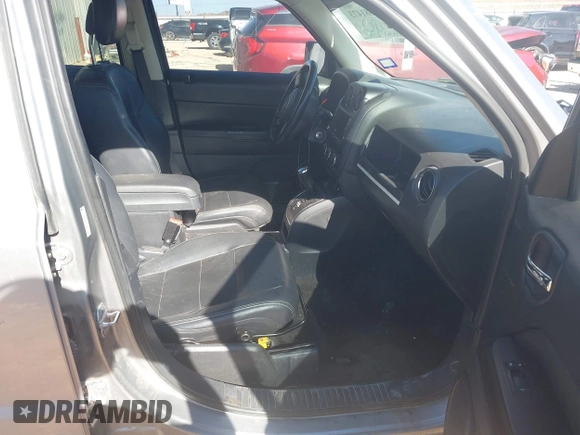 2014 Jeep Patriot High Altitude with VIN 1C4NJPFA4ED819007, listed as a IAAI auction lot 41381473 with 154,963 mi miles and . Bid and sale history available at carsss.com. Image 5.