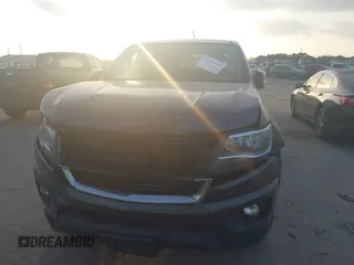 2016 Chevrolet Colorado 2WD LT z VIN 1GCGSCE37G1374901, wystawiony jako IAAI lot #41463562 z przebiegiem 163 716 mil mil oraz . Historia ofert i sprzedaży dostępna na DreamBid. Obrazek 12.