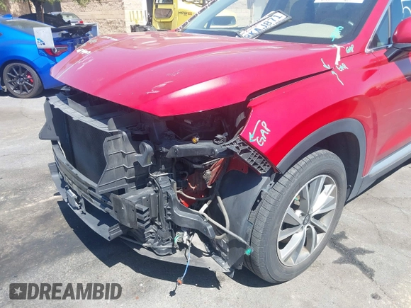2019 Hyundai Santa Fe SEL with VIN 5NMS33AD7KH113627, listed as a IAAI auction lot 41857170 with 75,813 mi miles and . Bid and sale history available at DreamBid. Image 20.