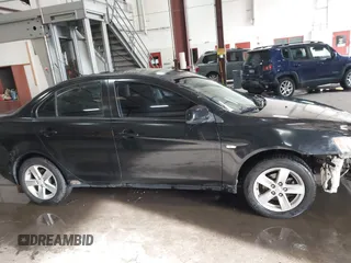 2008 Mitsubishi Lancer DE with VIN JA3AU26UX8U015865, listed as a IAAI auction lot 41108329 with 131,884 mi miles. Bid and sale history available at carsss.com. Image 14.